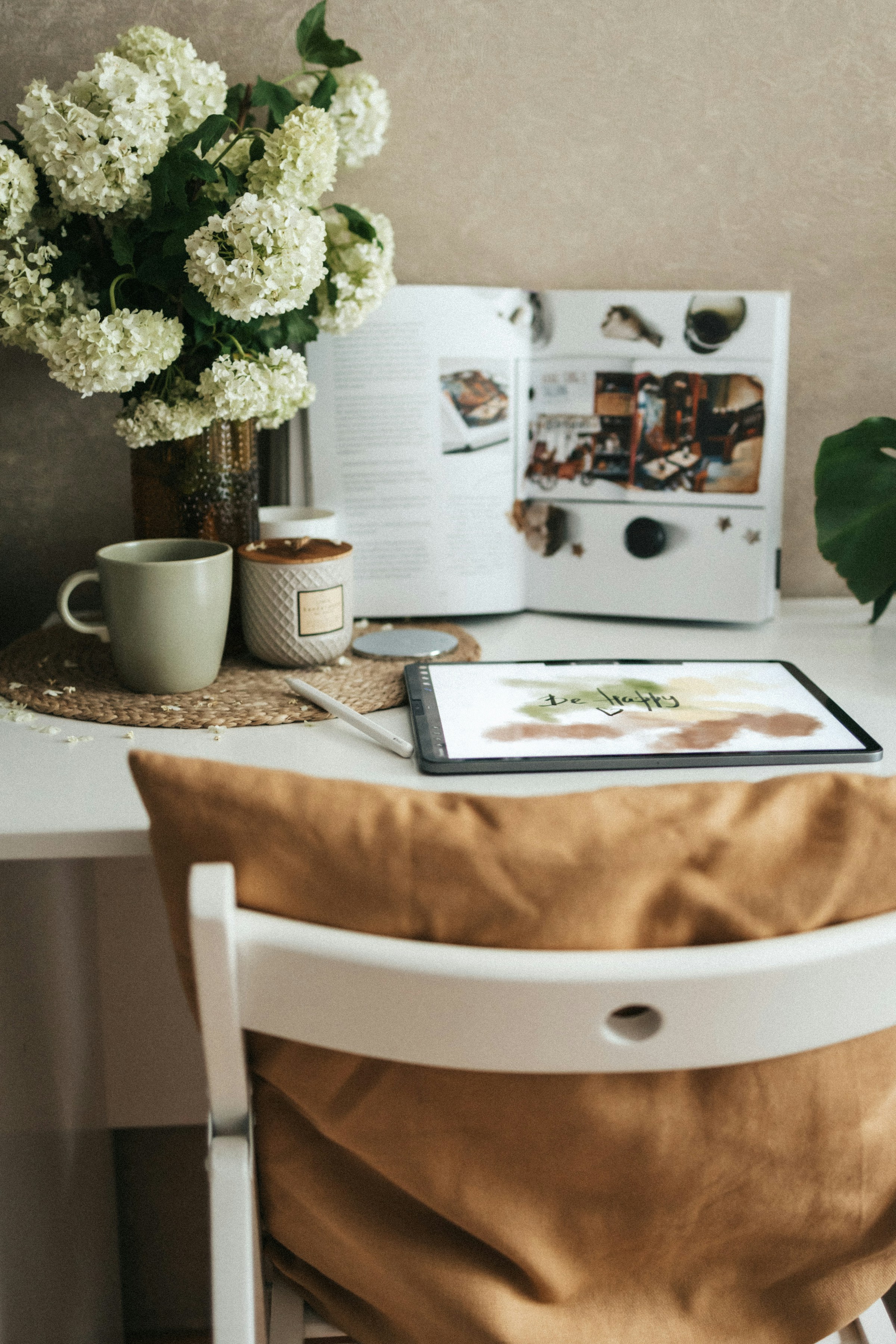 Warm workspace with desk lamp and natural light